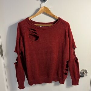 Jella.c brand 
Sweater with holes in design 
Good condition